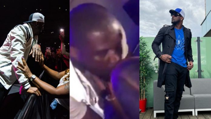 Mr. P a Nigerian singer received severe criticism for kissing an arbitrary fan Video
